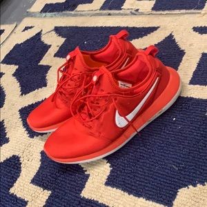 Red Nike running shoes